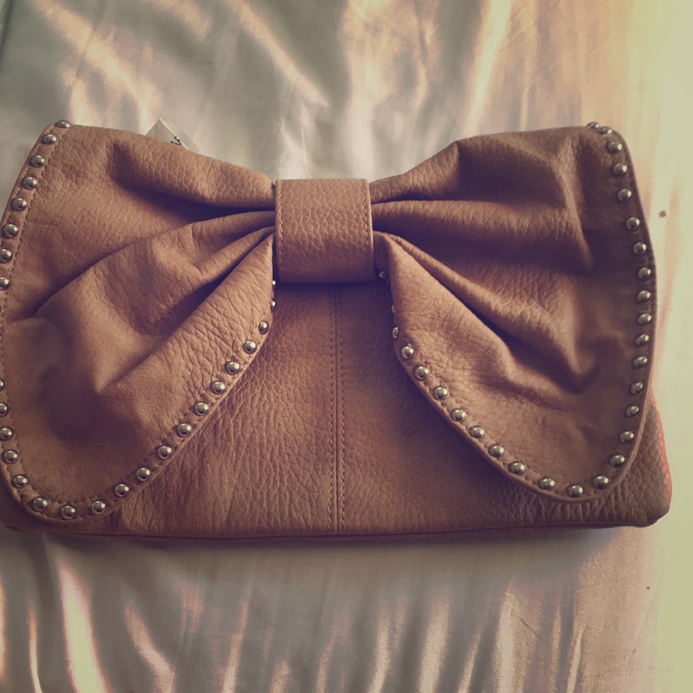 Tan bow crossbody bag